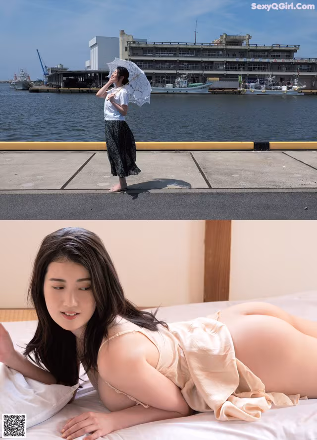 A woman laying on a bed holding an umbrella.